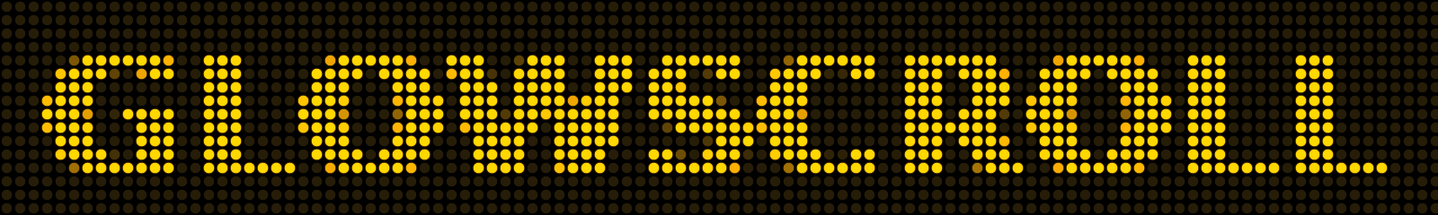 GLOWSCROLL in amber LED dots on a black sign.